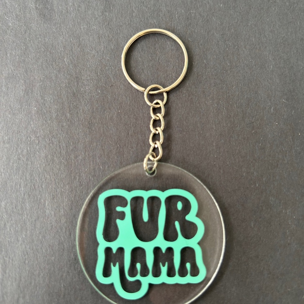 Handmade teal fur mama round acrylic keychain